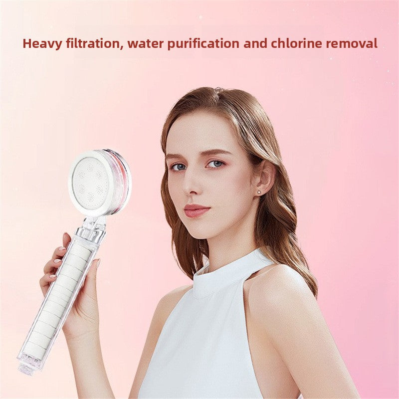 Filtering water purifying shower head